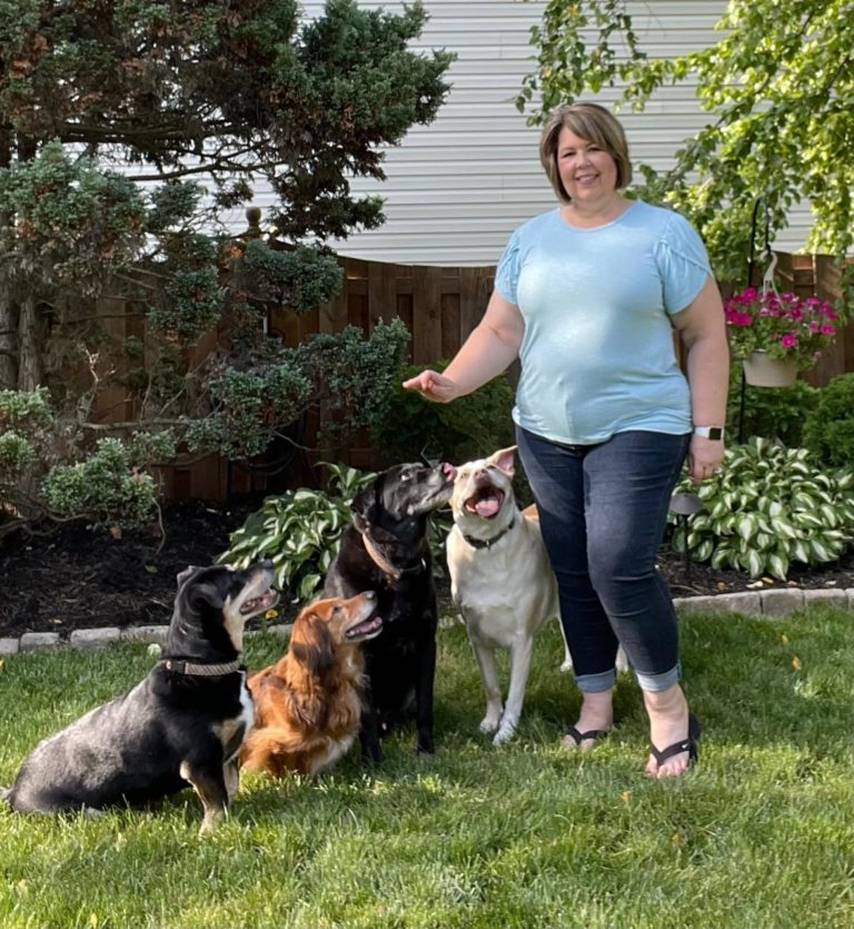 Tracy with her 4 dogs